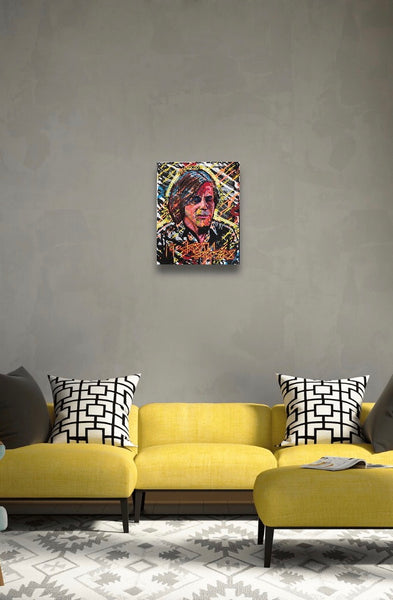 This portrait features Jackson Browne, and is titled ‘QUHESTIONING’. This painting is 16x20” acrylic on stretched canvas.  Artwork is shown hanging on a wall.