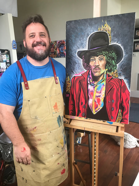 'LET ME STAND NEXT TO YOUR FIRE' Original painting. This original portrait is acrylic on 20x30" stretched canvas.  Artwork pictured on easel in the art studio with the artist.