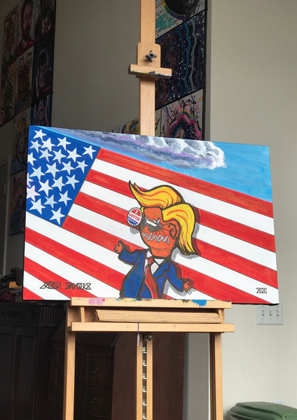 Painting of a Donald Trump Voodoo Doll entitled ‘I VOTED TODAY’. Original acrylic painting on a 20x30” stretched canvas. Artwork shown on my easel in my art studio.