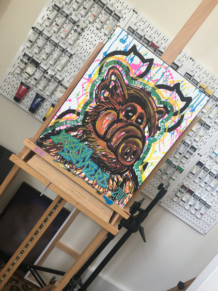This portrait features ALF, aka Gordon Shumway and is titled 'I KILL ME'. This is an acrylic painting on a 16x20 stretched canvas.  Shown on my artist easel in my studio.