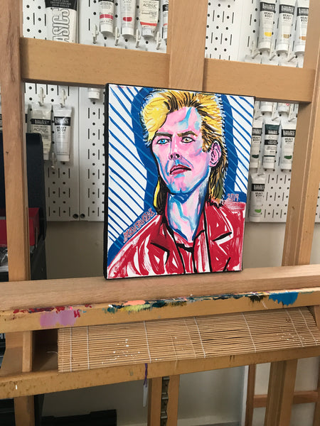 ‘DAVID BOWIE IN BERLIN’ original painting. This original portrait is acrylic on 8x10” stretched canvas.  Artwork shown on my easel in my art studio.